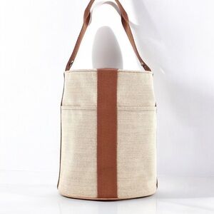 HERMES Saxo Toile H
Canvas Bucket Bag